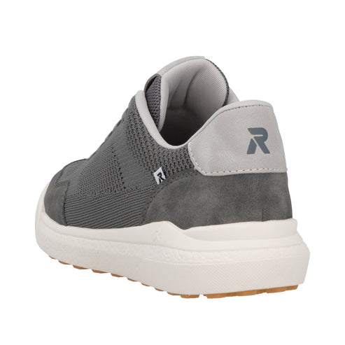 Gray low top sneaker with white rubber sole and "R" logo.