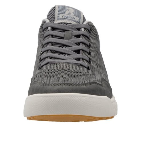 Gray sneaker with white sole and laces, visible 'R' logo on tongue.