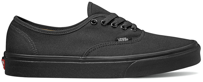 Black low profile sneaker with black laces and eyelets.
