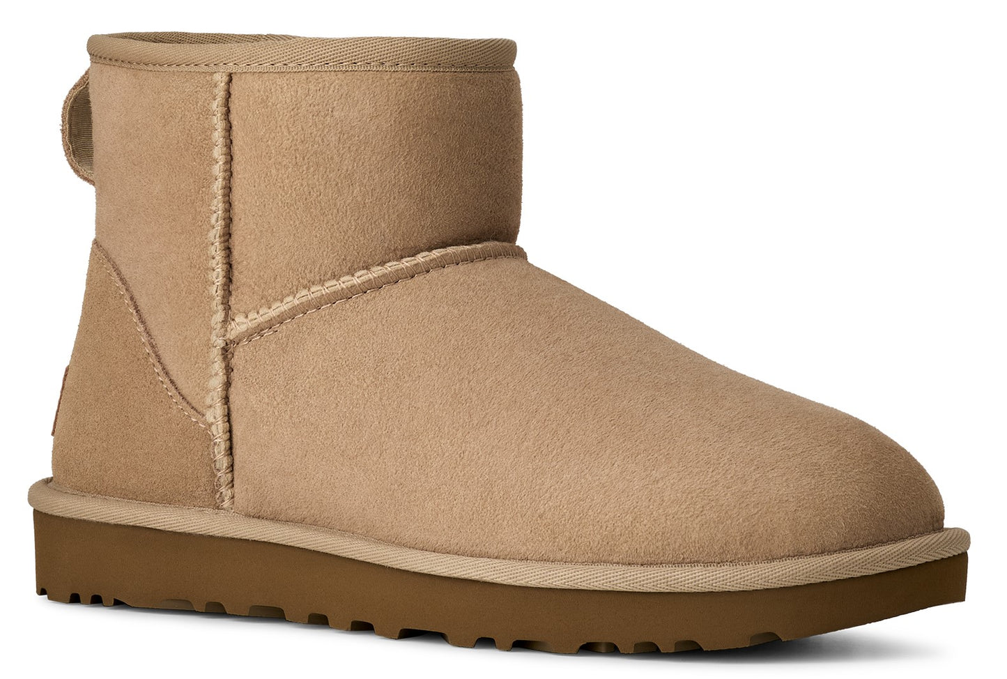 Tan ankle-high boot with a pull tab.