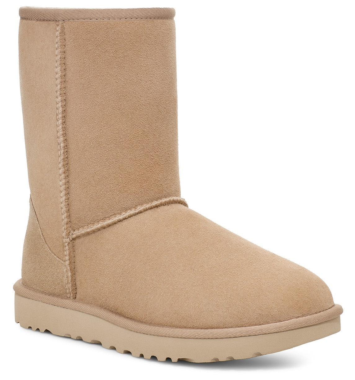 Short beige suede boot with a matching sole.