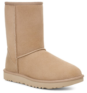 Short beige suede boot with a matching sole.