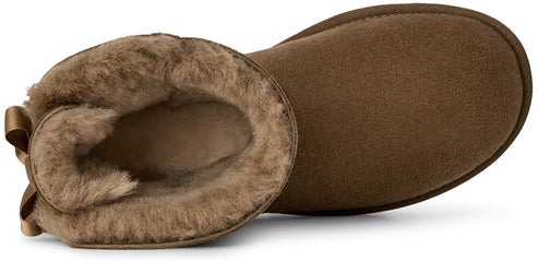 A top-down view of a brown suede winter boot with a thick, fluffy, tan sheepskin lining and a small brown bow detail at the back heel.
