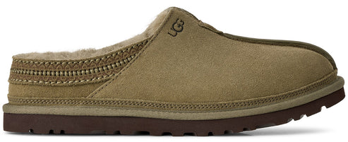 A tan suede slip-on slipper with a brown rubber sole, lined with tan faux fur and featuring a decorative woven pattern along the collar and the embossed brand logo on the upper side.
