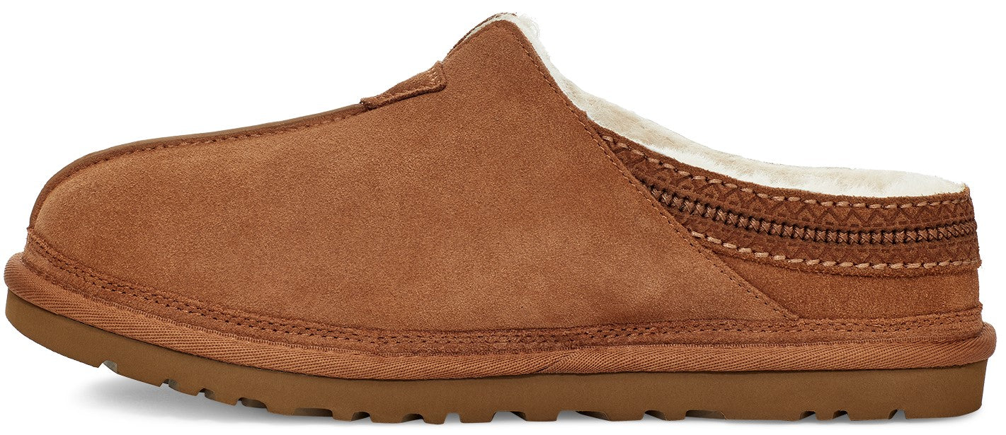 A brown suede slipper with a plush white fleece lining, a thick brown rubber sole, and a decorative braided trim around the heel opening.
