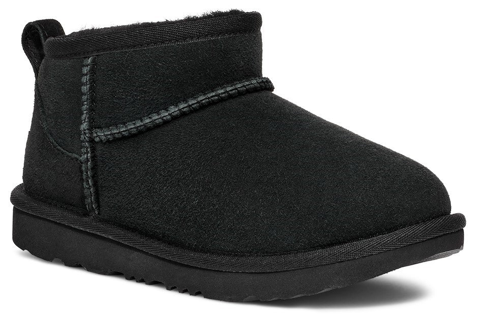 Black ankle boot with a short shaft, rounded toe, and flat sole.