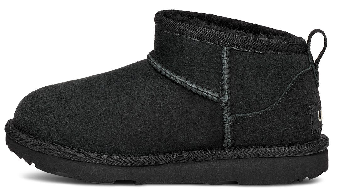 Side-view of black short boot with pull tab.