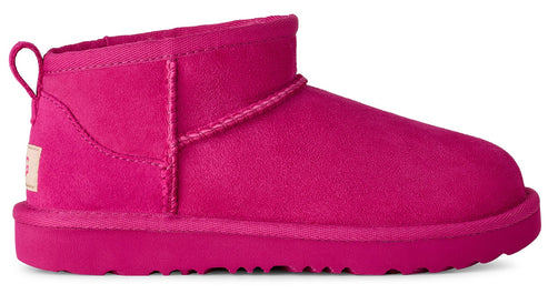 Bright pink suede UGG ankle boot with a looped pull tab.