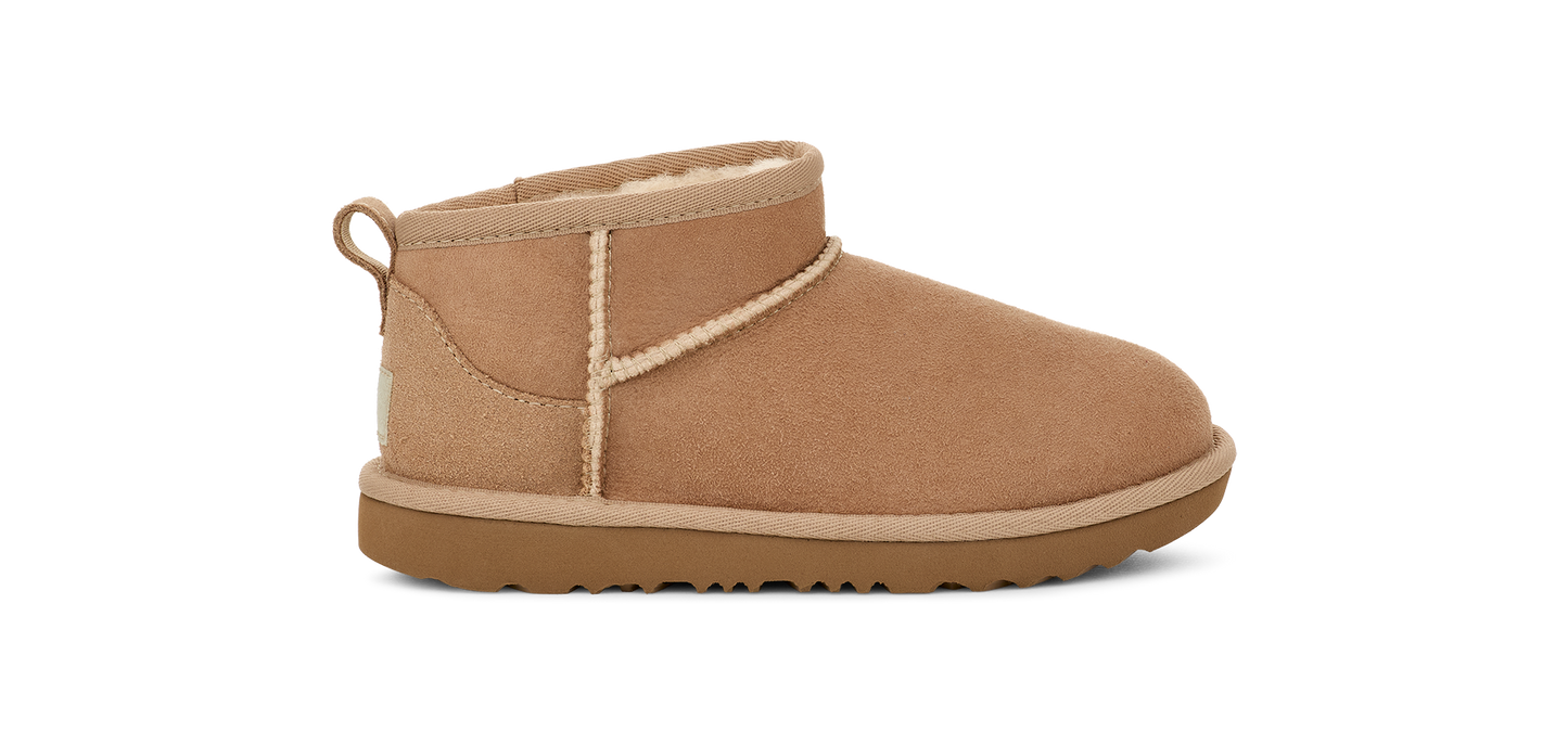 A tan ankle boot with a loop on the back.