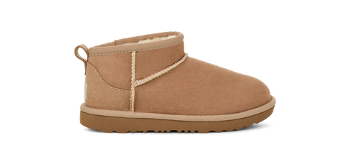 A tan ankle boot with a loop on the back.