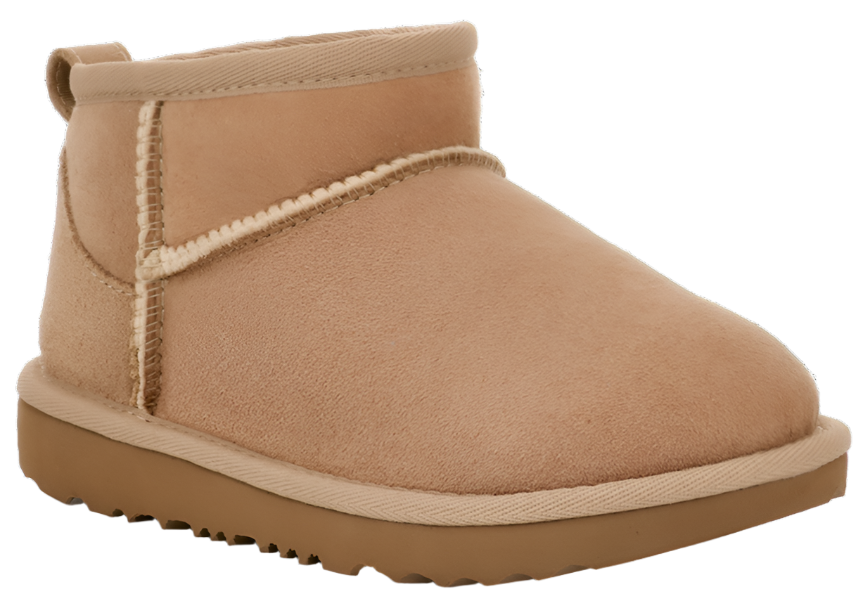 Tan, short boot with light trim and dark sole.