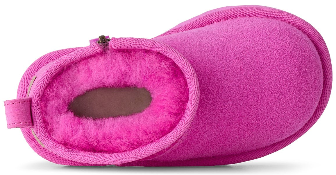 A top-down view of a bright pink, ankle-high winter boot lined with fluffy, matching pink faux fur.