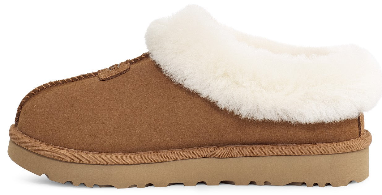 Tan slipper with cream-colored faux fur trim and matching sole.