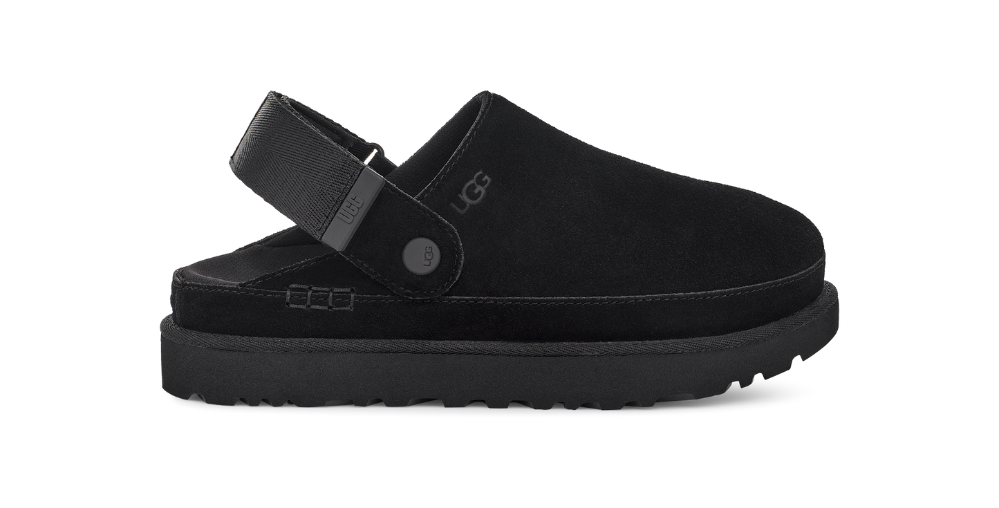 Black slip-on clog with a black strap, black platform sole, and logo on side.