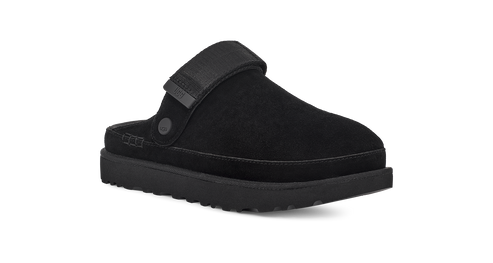 Black slip-on shoe with a thick sole and a strap.