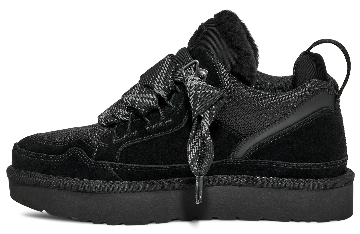 Black platform sneaker with patterned laces.