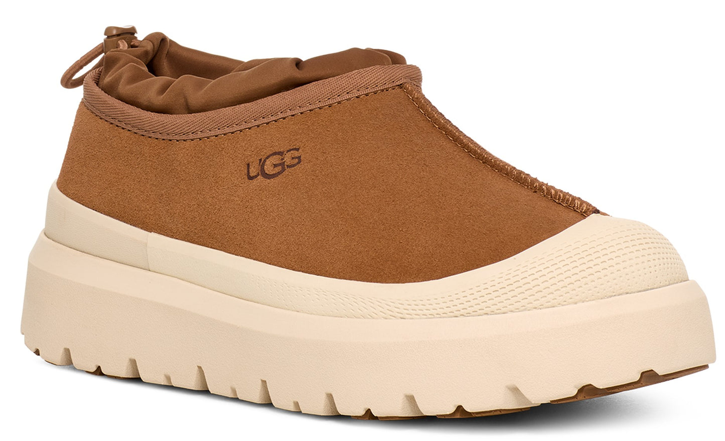 Tan casual shoe with a thick, off-white, lugged sole and "UGG" on the side.