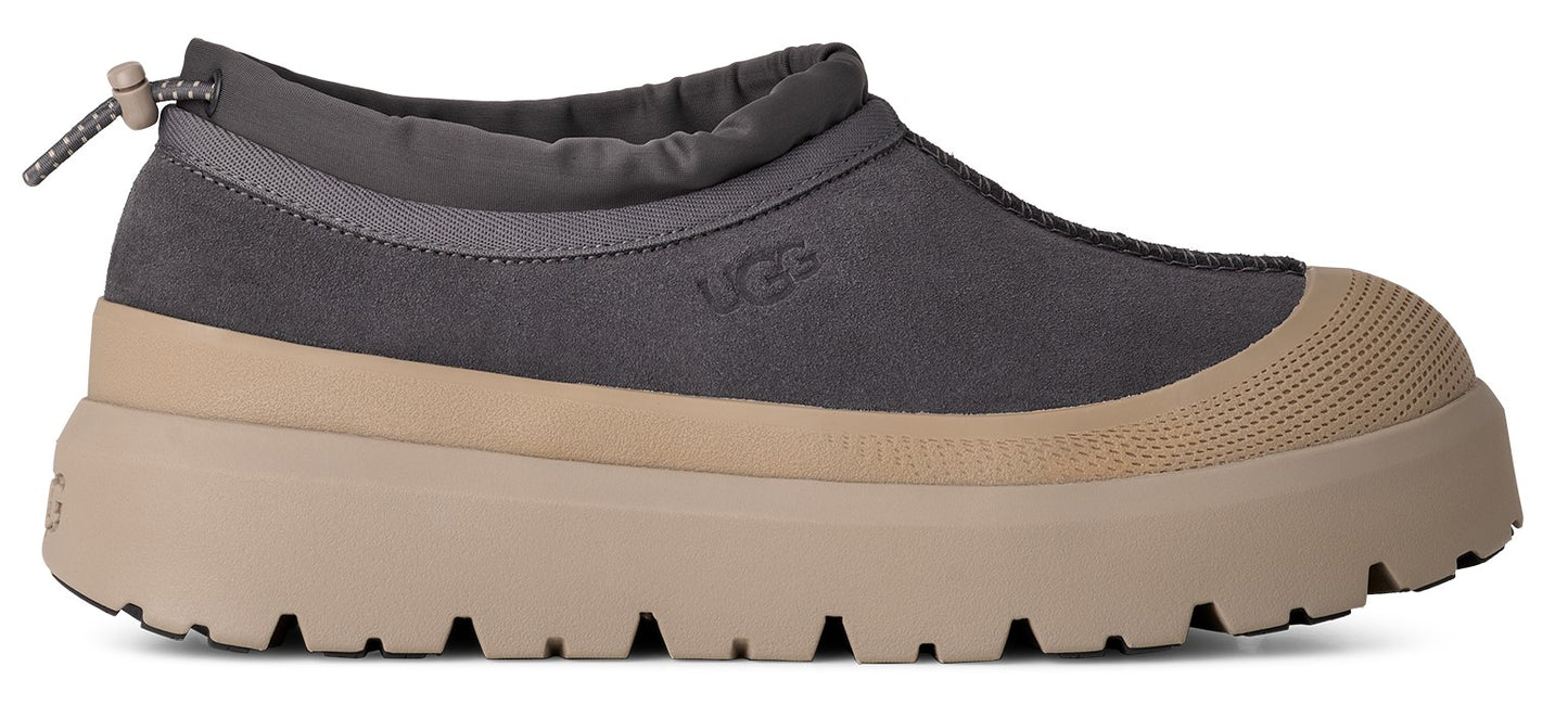 An UGG grey shoe with beige platform sole and round toe.