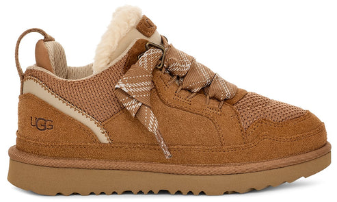 Tan UGG sneaker with decorative laces and fluffy lining.