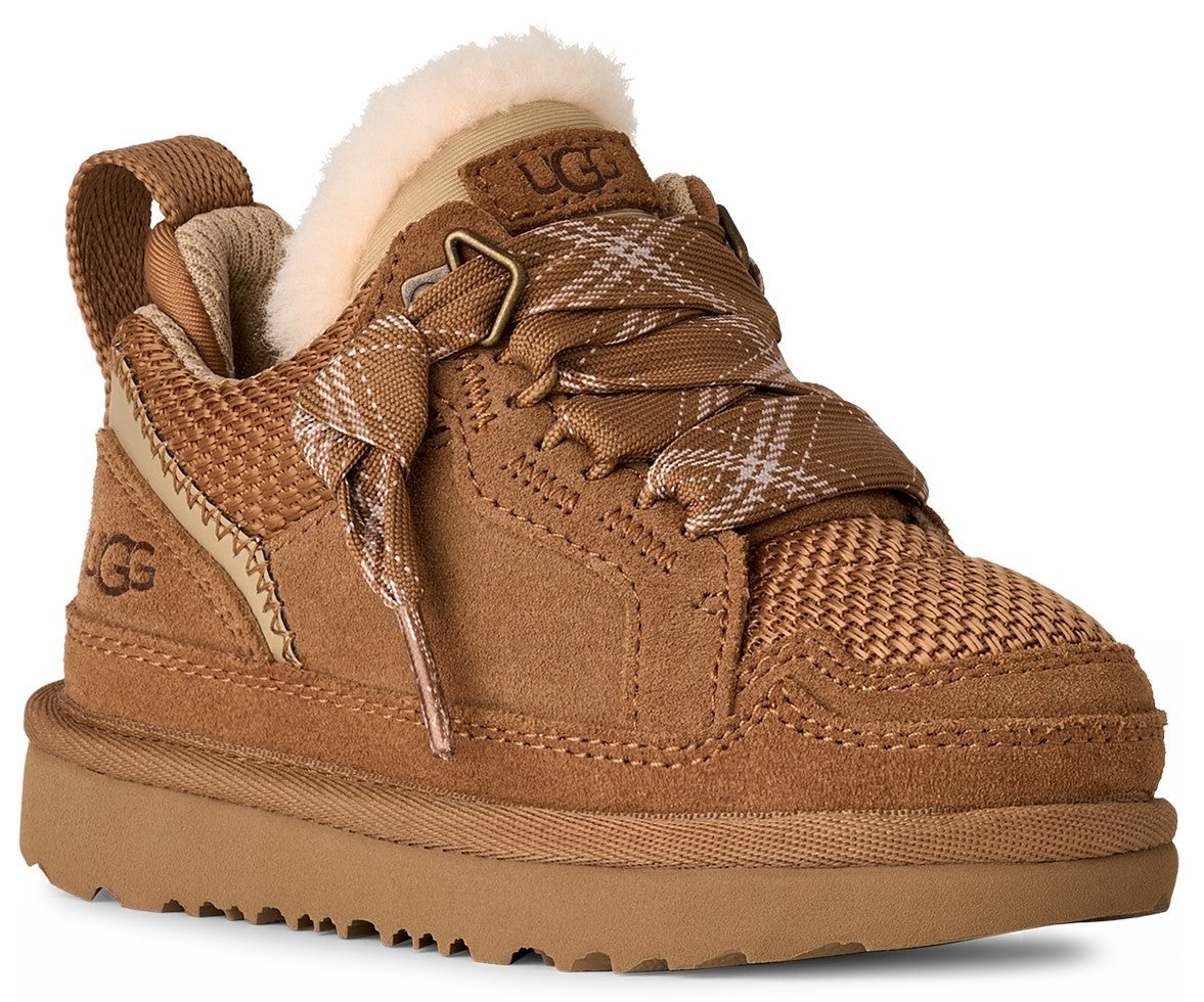 A brown children's sneaker with plaid-like laces, shearling trim and a pull tab.