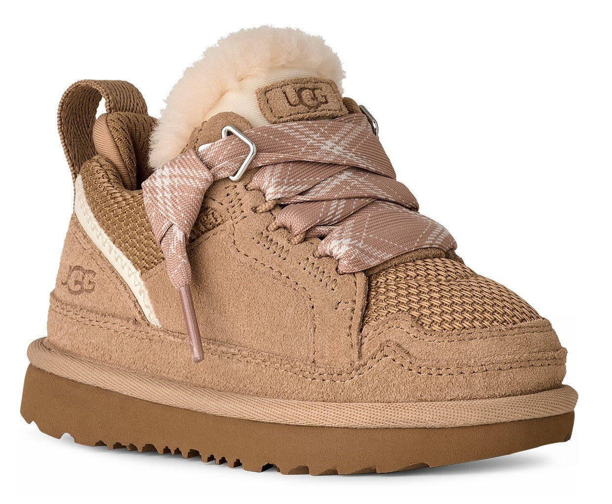 Child's light brown sneaker with tan sole, fluffy cream trim, patterned ribbon laces, and UGG logo on the side and tongue.