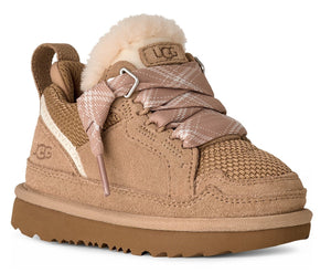 Child's light brown sneaker with tan sole, fluffy cream trim, patterned ribbon laces, and UGG logo on the side and tongue.