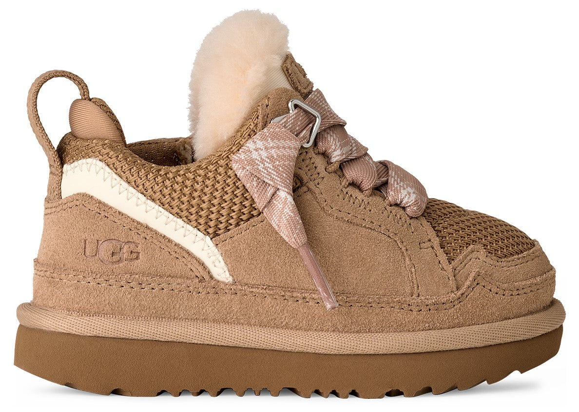 Tan sneaker with fuzzy, light-colored lining and plaid laces.