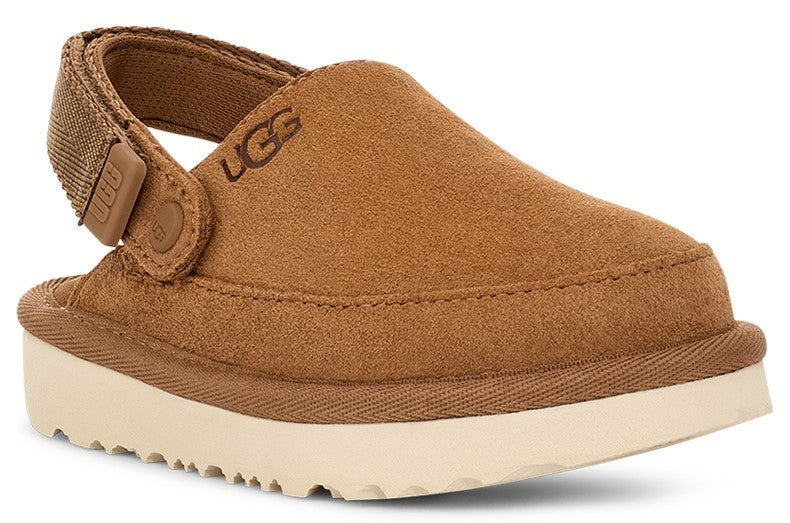 Brown suede clog with UGG logo, adjustable Velcro heel strap and off-white serrated sole.