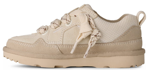 A low-profile, off-white sneaker with textured suede and a rope-patterned lace.