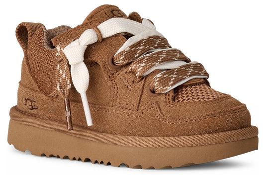 A light brown suede sneaker with thick white and light brown patterned laces.