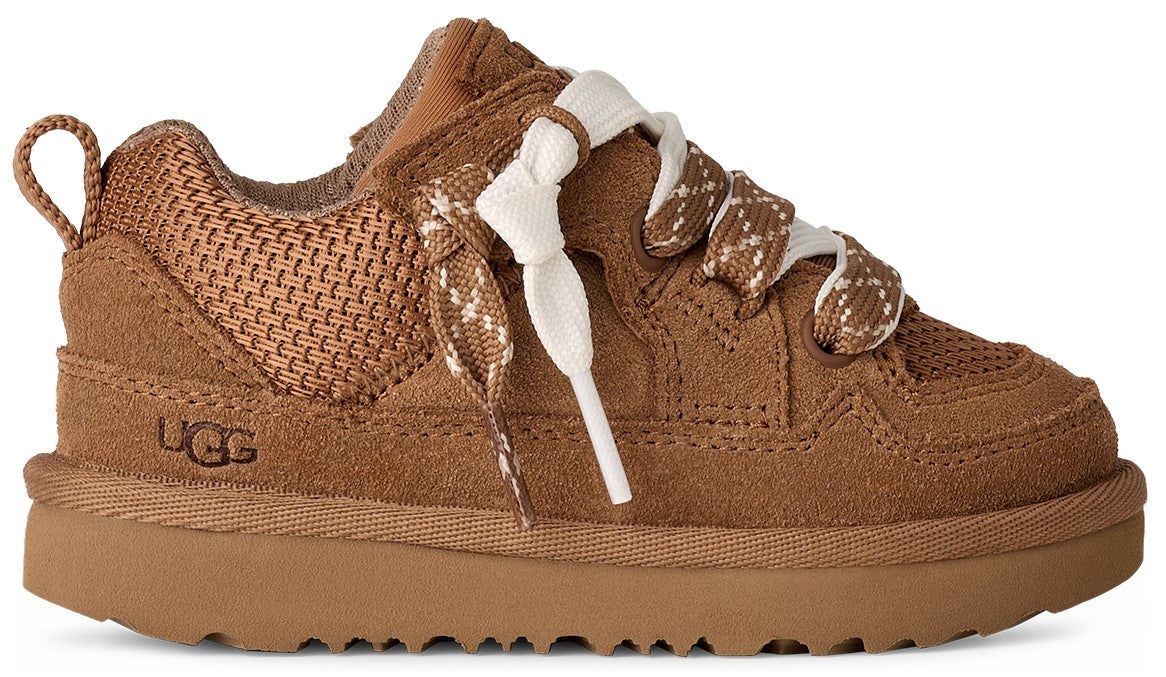Brown sneaker with textured mesh and suede, featuring decorative laces and a loop at the heel with the letters "UGG" at the side.