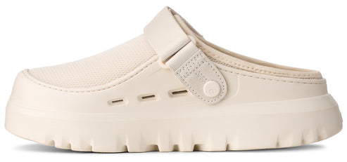A light beige clog-style shoe with a thick, lugged sole and a strap.