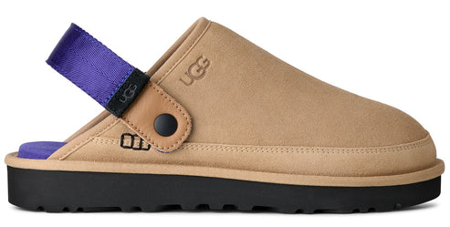Tan clog with a black sole, and a purple fabric heel strap.