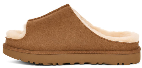 A brown suede slipper with an open toe, a thick sole, and a faux-fur lining.