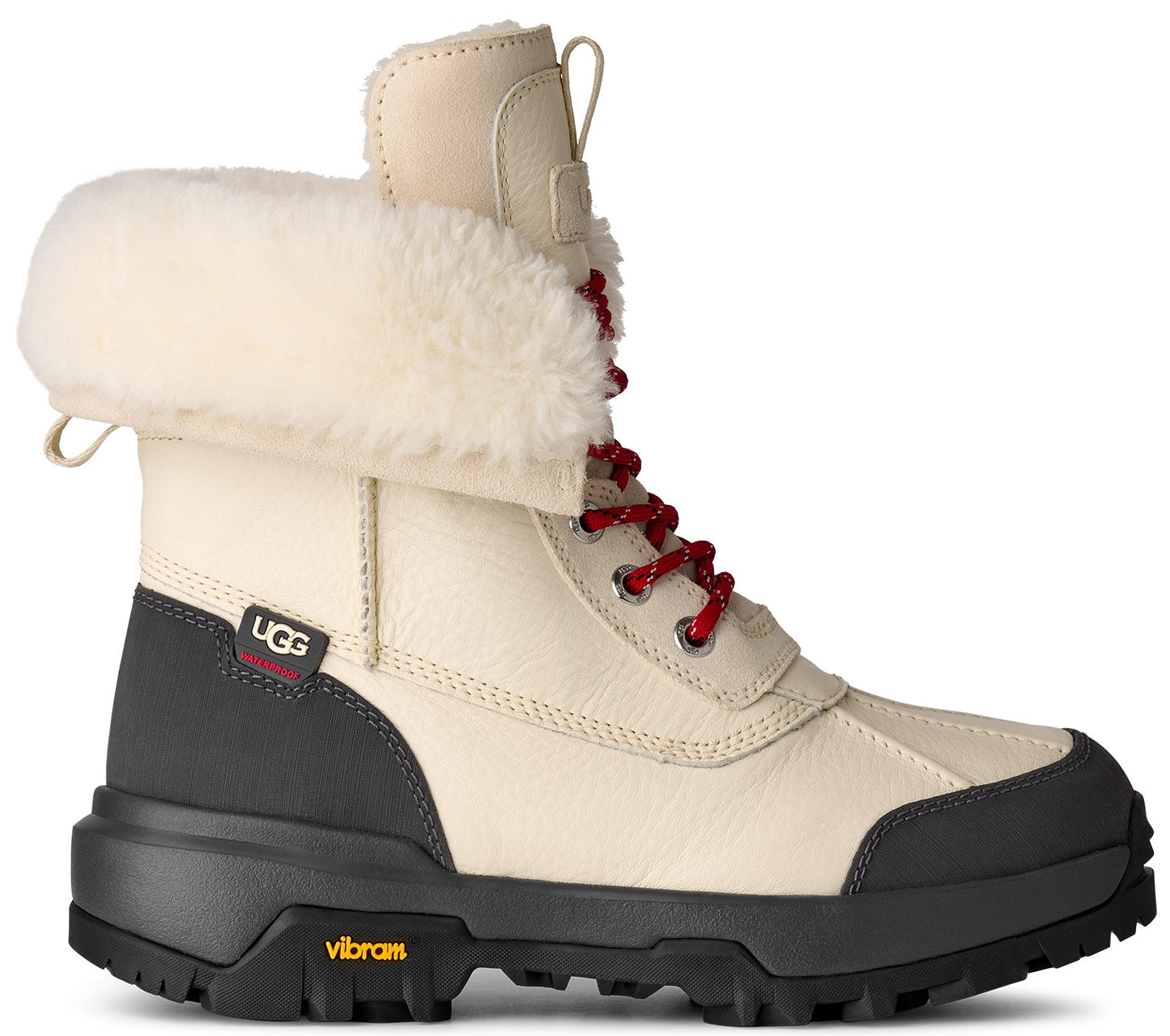 High-cut off-white boot with fur lining, red laces, Vibram sole, and a UGG logo on the side.