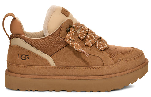 A low-rise tan shoe with tan laces and a thick tan sole. The word UGG is visible on the side.