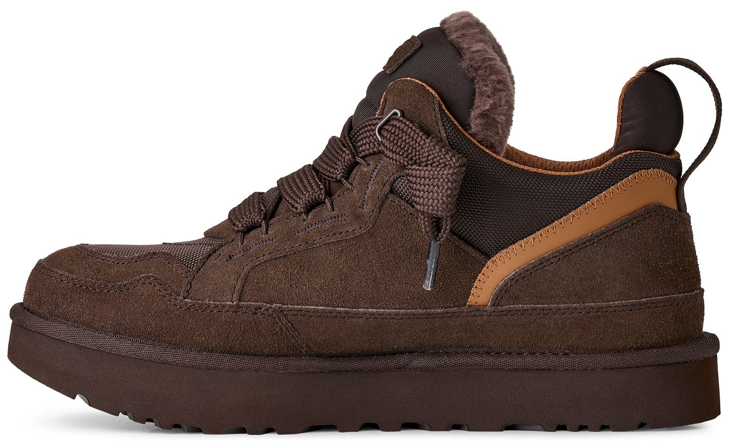 A brown suede sneaker with a chunky sole, fur-lined tongue, and tan trim on the heel.