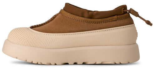 A shoe with a brown upper and a beige rubber sole.