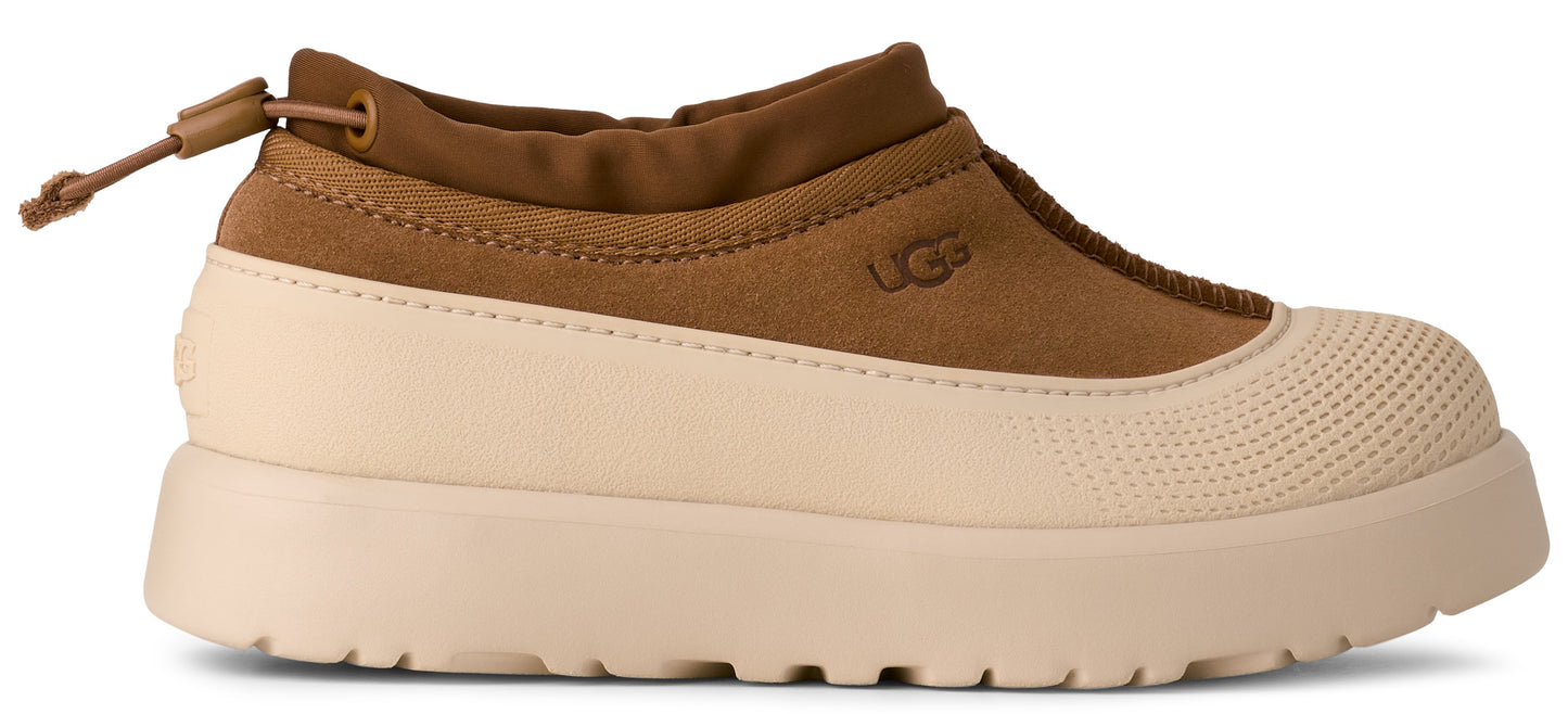 A tan-and-beige platform shoe with a drawstring.