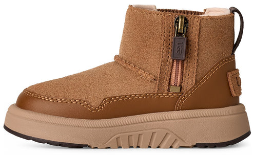 A child's ankle-high, tan suede boot with zipper.