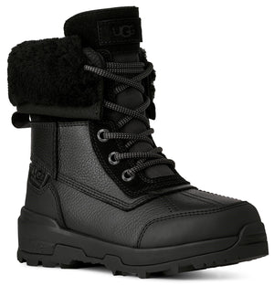 A black leather lace-up winter boot with a lugged sole, featuring a fur-lined collar and the word UGG embossed on the tongue and side.