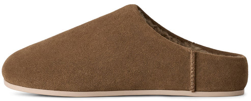 A brown suede mule slipper with a flat, light-colored sole and a fuzzy brown interior lining.