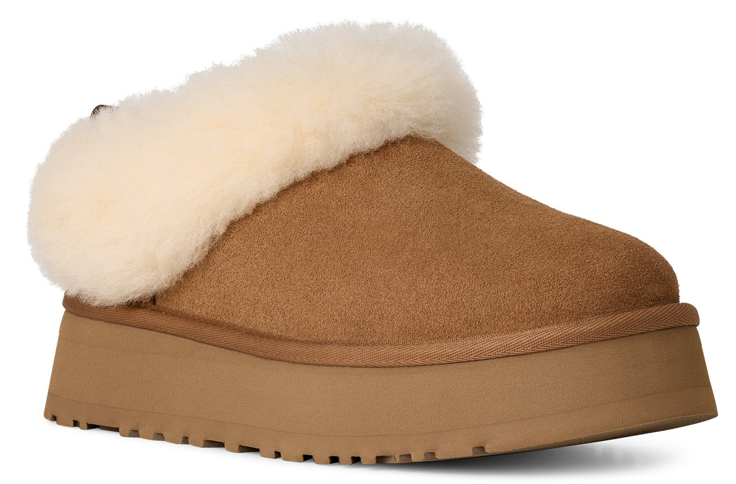 A light brown suede platform slip-on slipper, with a band of thick white fleece.
