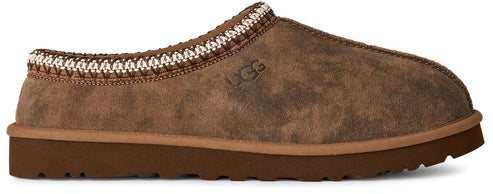 A brown suede slipper with a decorative knit trim.