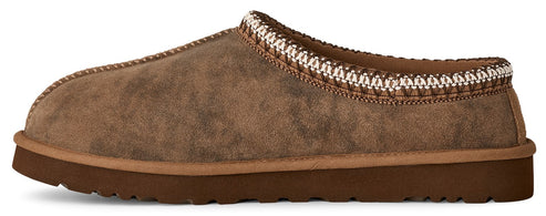 A brown slip-on shoe with a thick sole and a decorative white and brown trim.