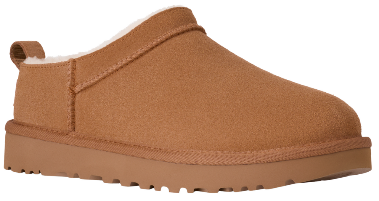 Slip-on brown suede clog with a fluffy collar and a pull tab on the heel.