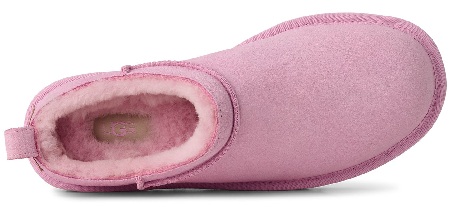 Pink UGG boot with fur lining seen from above.