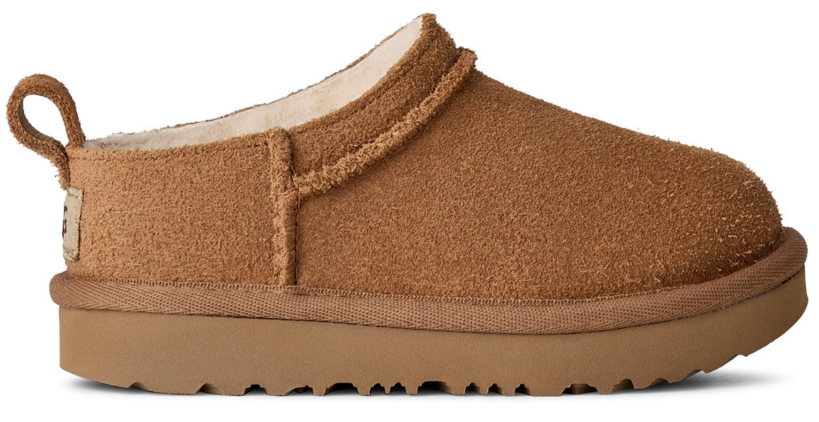A light brown slip-on clog with a pull loop on the back.