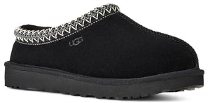 Black slip-on slipper with a black sole and a patterned trim.