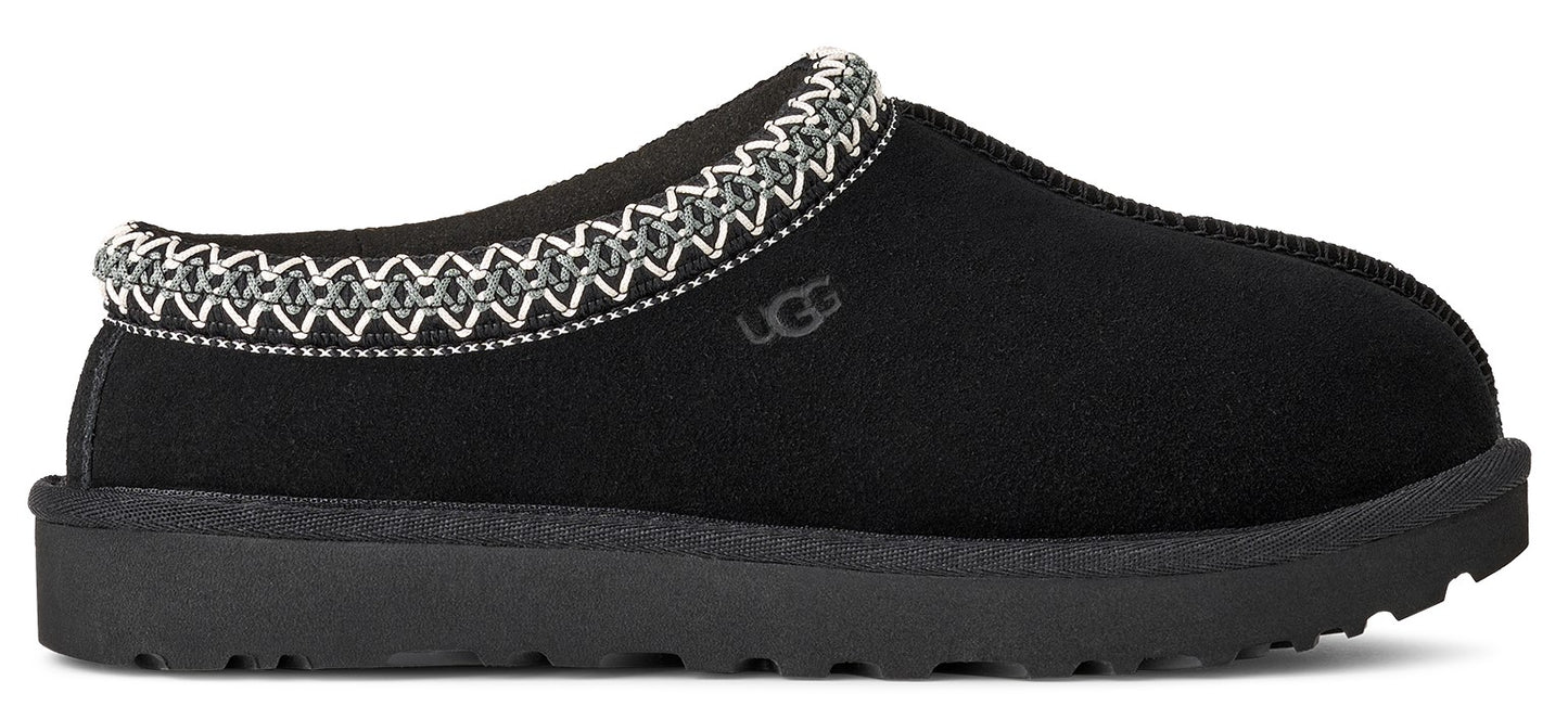 Black slip-on shoe with patterned trim.
